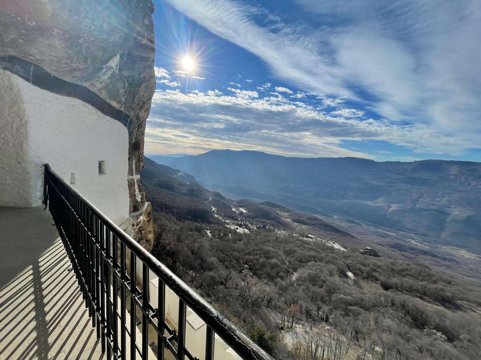 Monastery terrace overlooking the mountain valley