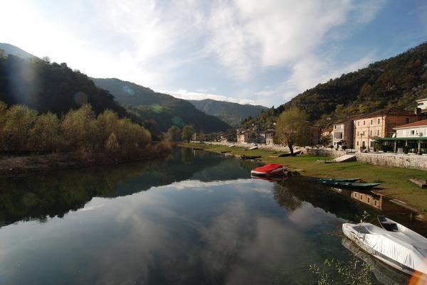 View of the Rijeka Crnojevića river valley with boats